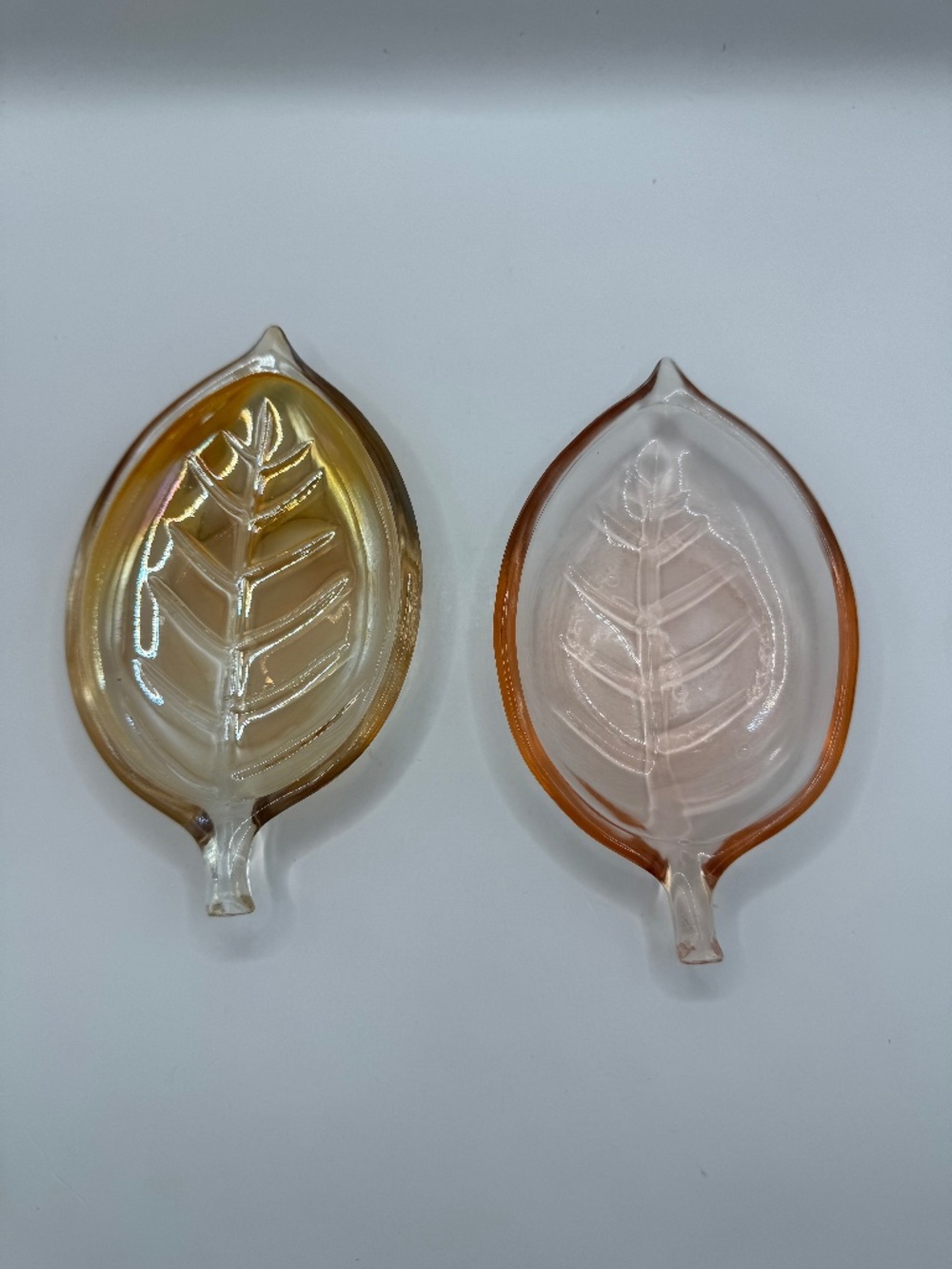 Set of 2 Pier 1 iridescent glass ring dishes. Leaf shaped trinket dish.